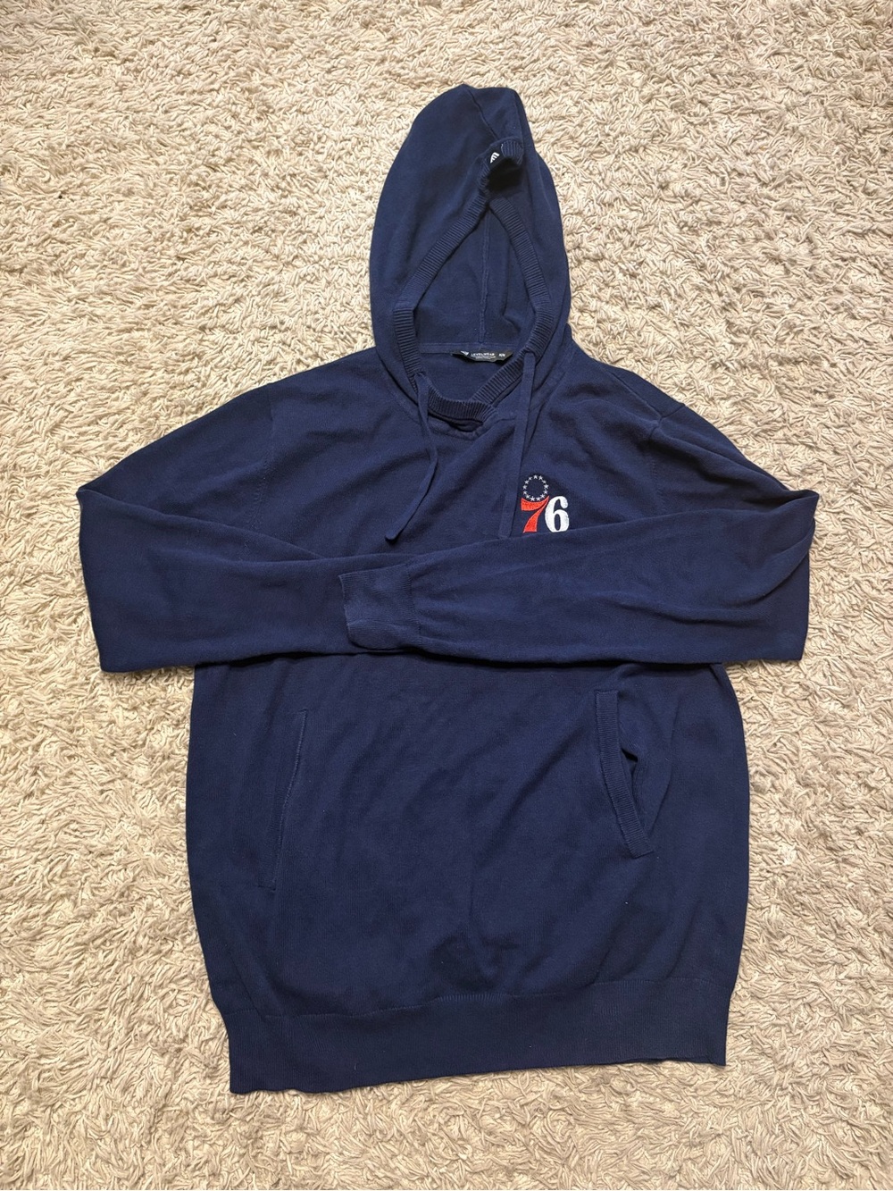 Navy blue 76ers hoodie with white and red logo, size M